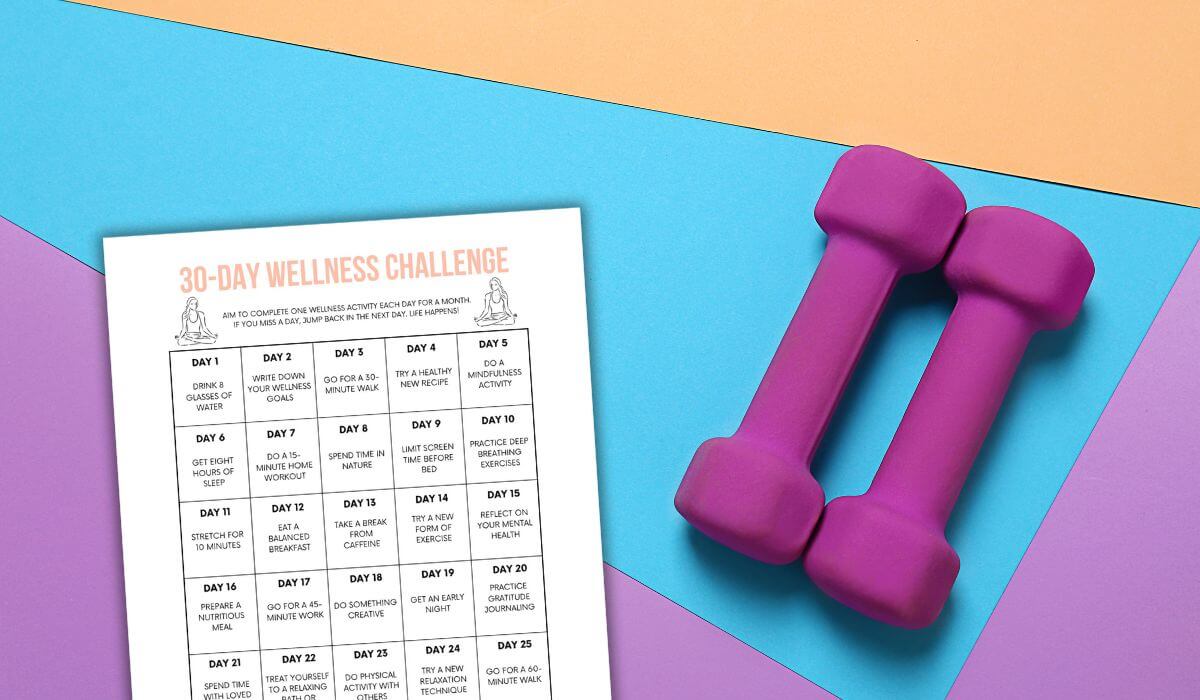 free printable 30 day wellness challenge next to purple free weights and colourful background.