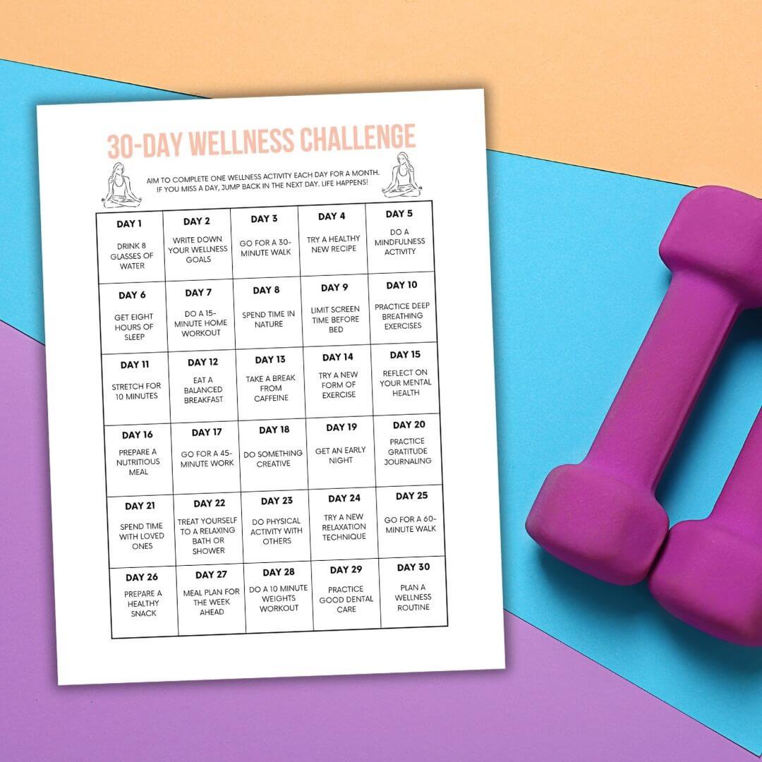 free printable 30 day wellness challenge next to purple free weights.